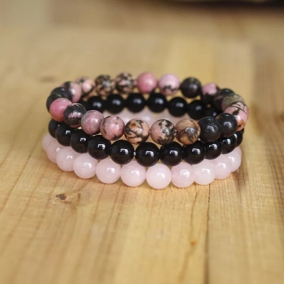 Armbanden met onyx, rozenkwarts en rhodoniet